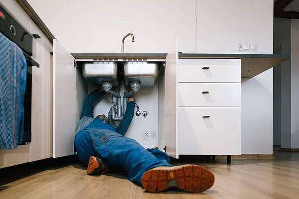 Professional Plumbing technician working in Warrensburg, IL